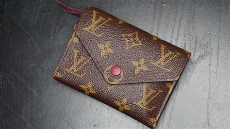 victorine wallet louis vuitton gold button|authentic louis vuitton women wallet.